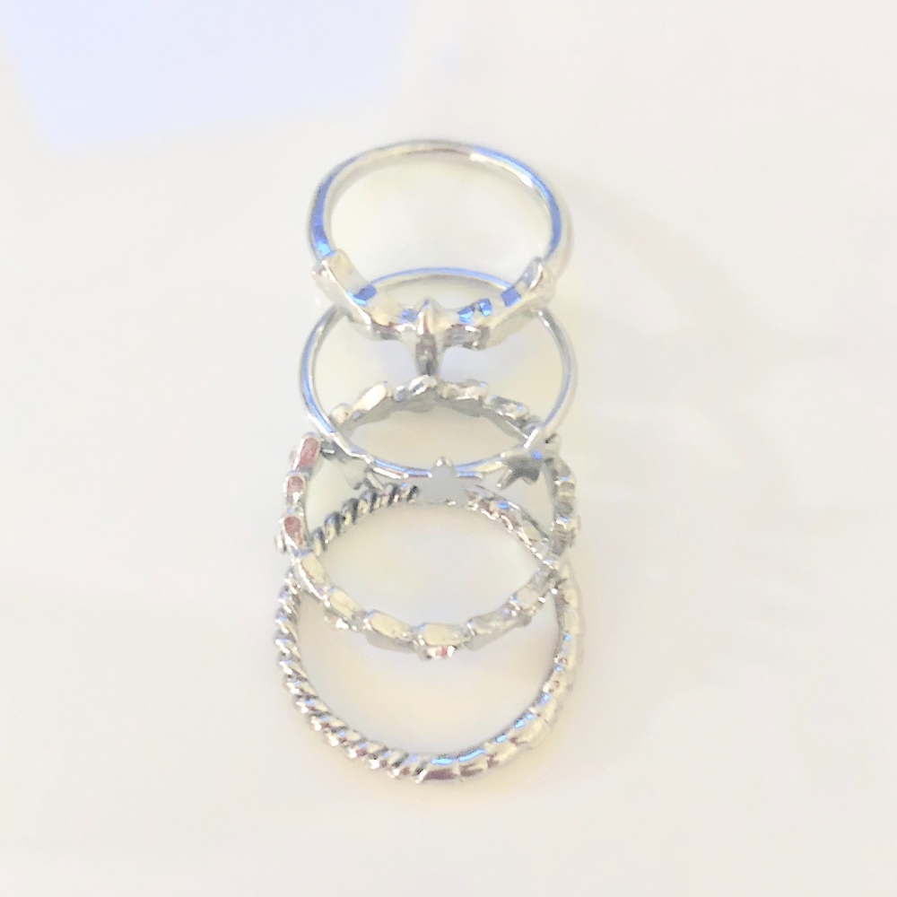 TOBI: SET OF FOUR SILVER RINGS💍